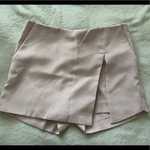 Baby pink skort with pockets.